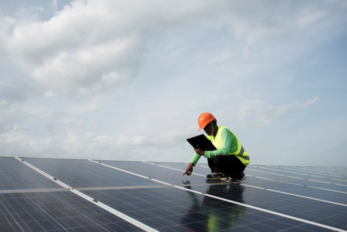 technician-engineer-checks-maintenance-solar-cell-panels